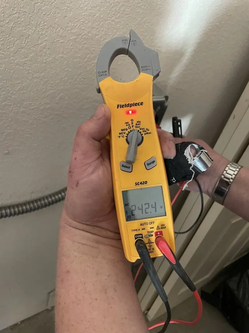 Voltage testing with clamp meter during Circuit Breaker Repair in Palmer